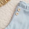 Legginsy prążkowane dla dziecka z guzikami kolor błękit