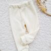 Legginsy sweterkowe dla dziecka kremowe