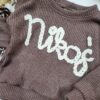 Sweterek z napisem Nikoś cappucino