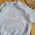 Bluza dziecięca baby blue z aplikacją dinozaur