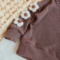 Sweterek dla dziewczynki cappucino z kwiatami jasny beż