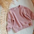 Sweterek dla dziewczynki róż pastelowy