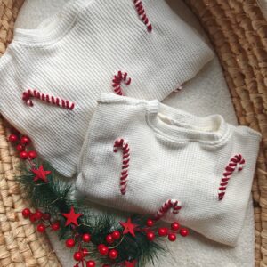 Sweterek świąteczny dla dziecka laski cukrowe ecru