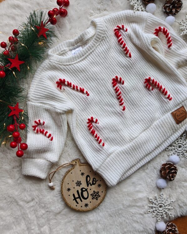 Sweterek świąteczny dla dziecka z laskami cukrowymi ecru