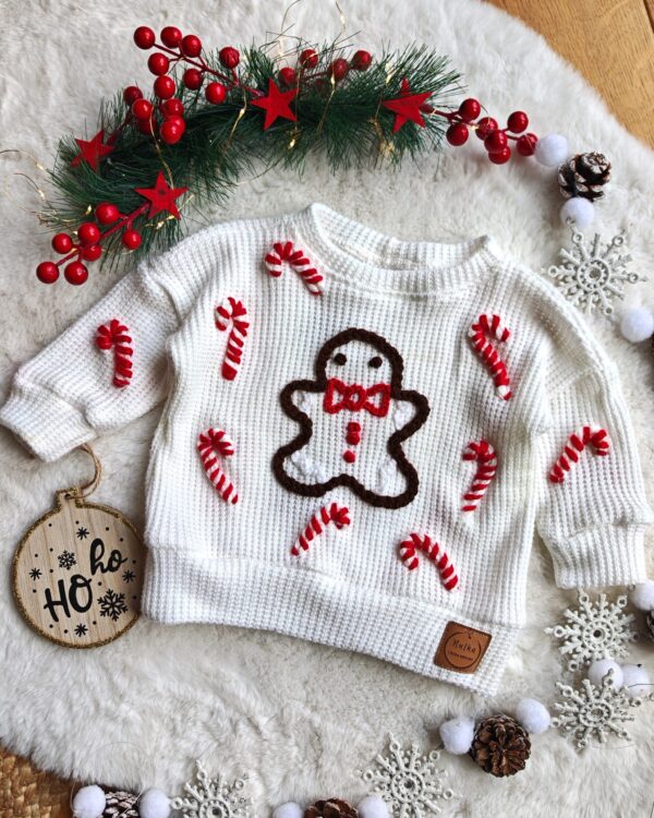 Sweterek świąteczny dla dziecka ludzik z piernika ecru
