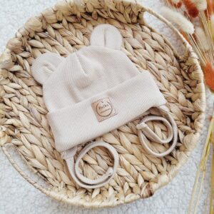 Czapka prążkowana wywiana wiązana z uszkami jasny beż